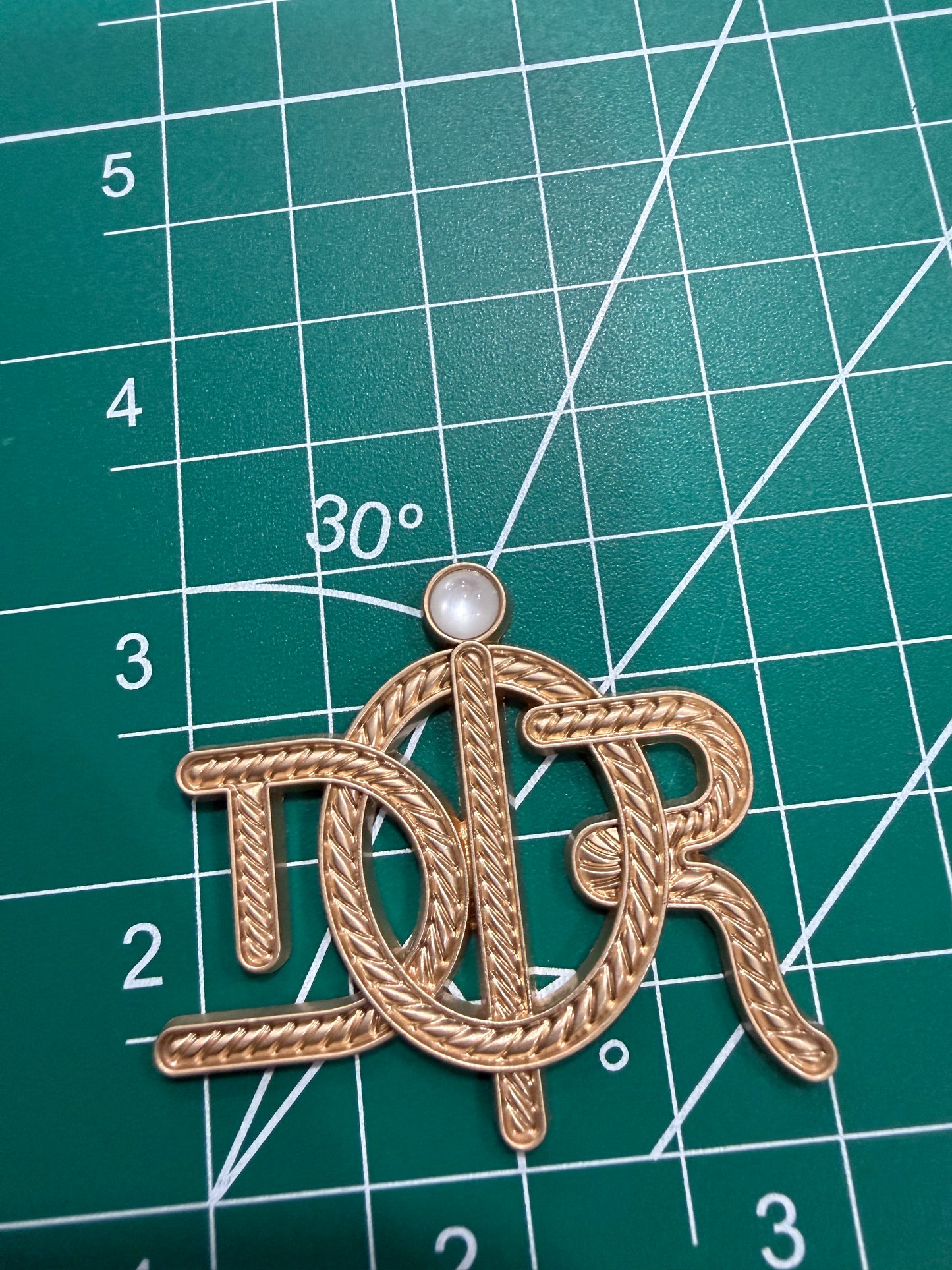 Luxury flat back charms Dio