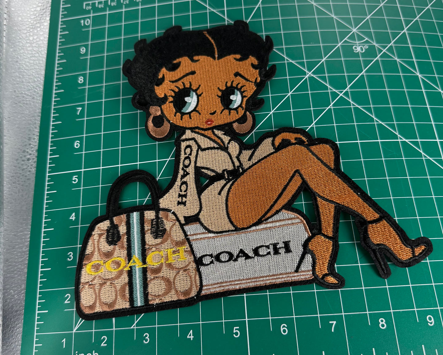 Ms. Debi Cigar  Box and big patches