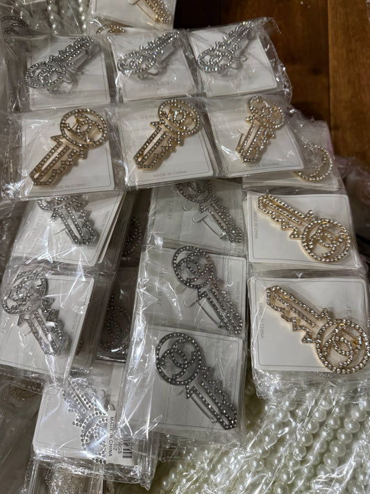 C Key Brooches
